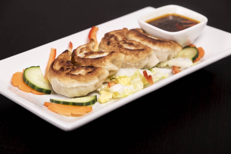 Grilled dumplings with chilli garlic sauce
